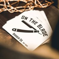 @onthebladebarberco